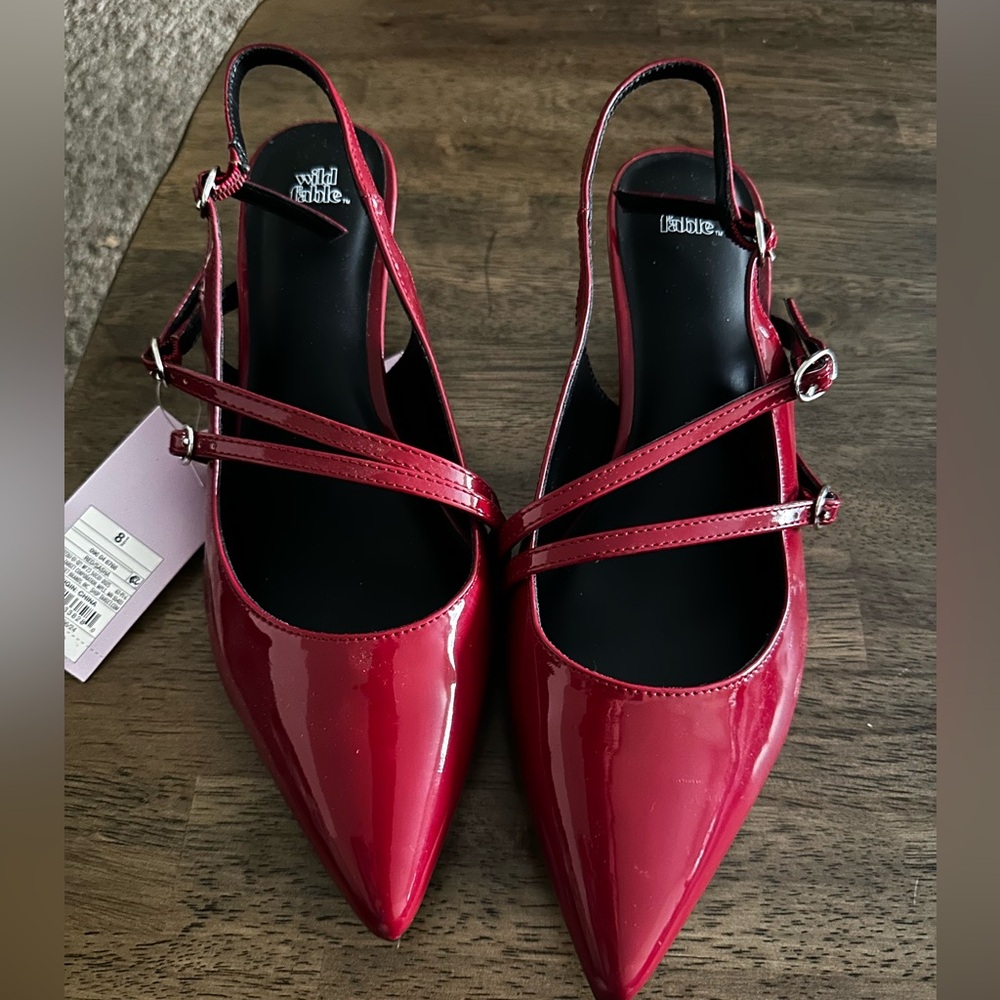 Red buckled strapped kitten heels
